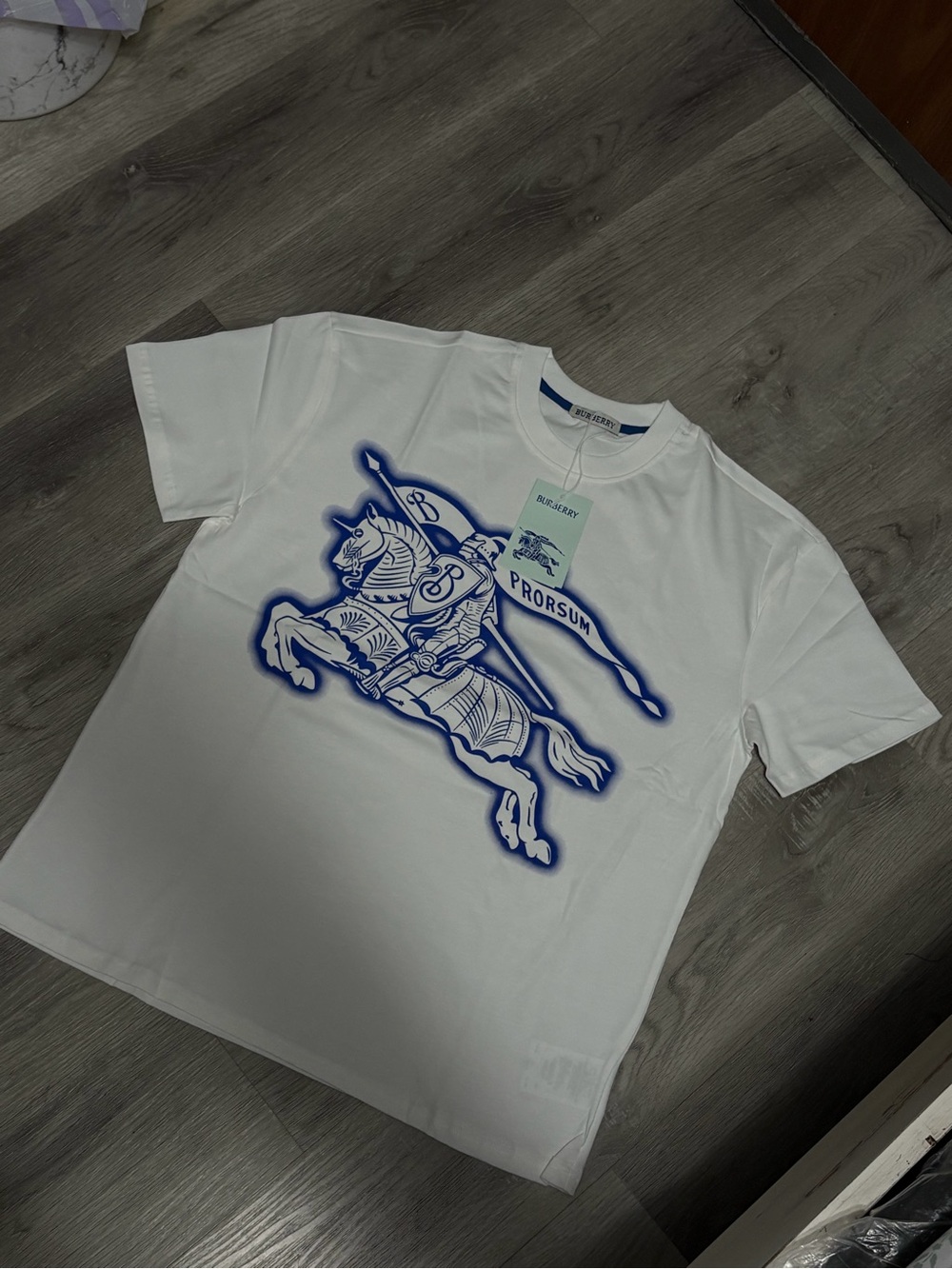B.U.R.B.E.R.R.Y White Tee with Blue Horse Graphic